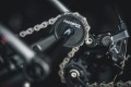Prowadnica łańcucha Feedback Sports Thru-Axle Chain Keeper, sztywna oś